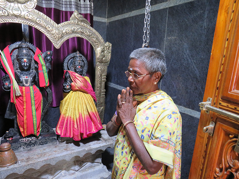 A woman prays at a temple in Kesalingayapalli village in Andhra Pradesh, India, in early Feb. 2023. Photo by Priyadarshini Sen