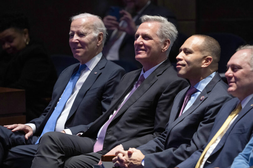 From left, President Joe Biden, Speaker of the House Kevin McCarthy of California, House Minority Leader Hakeem Jeffries of New York, and House Majority Leader Steve Scalise, R-La., listen during a sermon as they sit together at the National Prayer Breakfast, at the Capitol in Washington, Feb. 2, 2023. (AP Photo/J. Scott Applewhite)