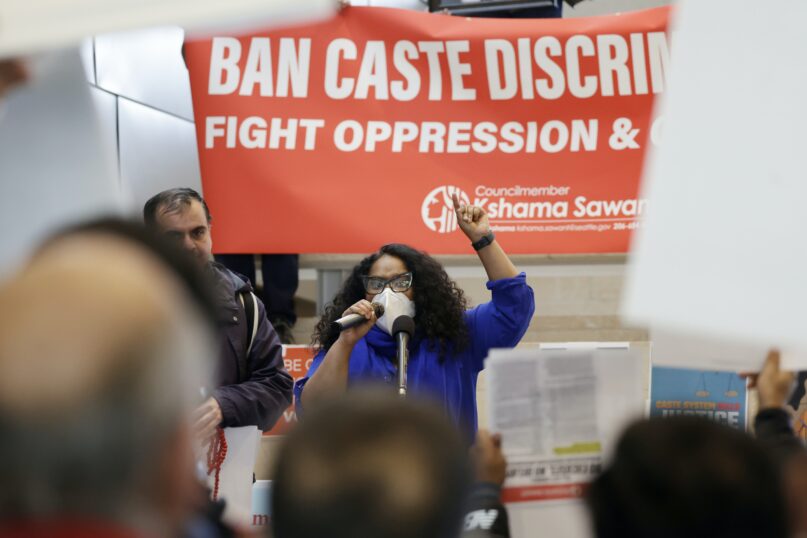 Speakers discussing the proposed ordinance to add caste to Seattle’s anti-discrimination laws at Seattle City Hall, on Feb. 21, 2023. (AP Photo/John Froschauer)