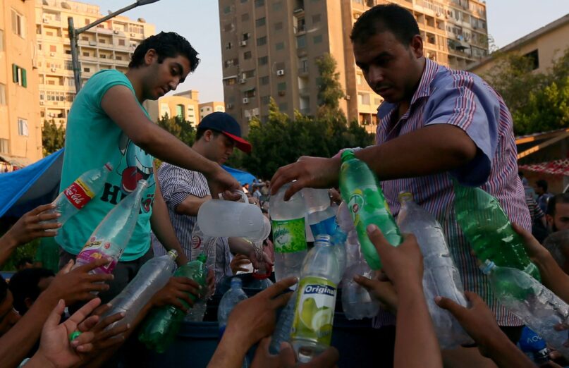 Plastic, yes. But at least the bottles are being reused. (Marwan Naamani/AFP via Getty Images))