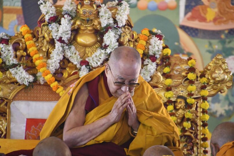 Tibetan spiritual leader Dalai Lama leads a prayer in the Indian state of Bihar on Jan. 1, 2022.  (Sandeep Kumar/Anadolu Agency via Getty Images)
