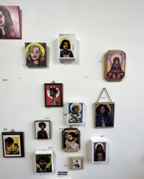 A variety of modern saints icons hand-painted by Gracie Morbitzer adorn the walls of the artist's Columbus, Ohio, studio on Feb. 27, 2023. RNS photo by Kathryn Post