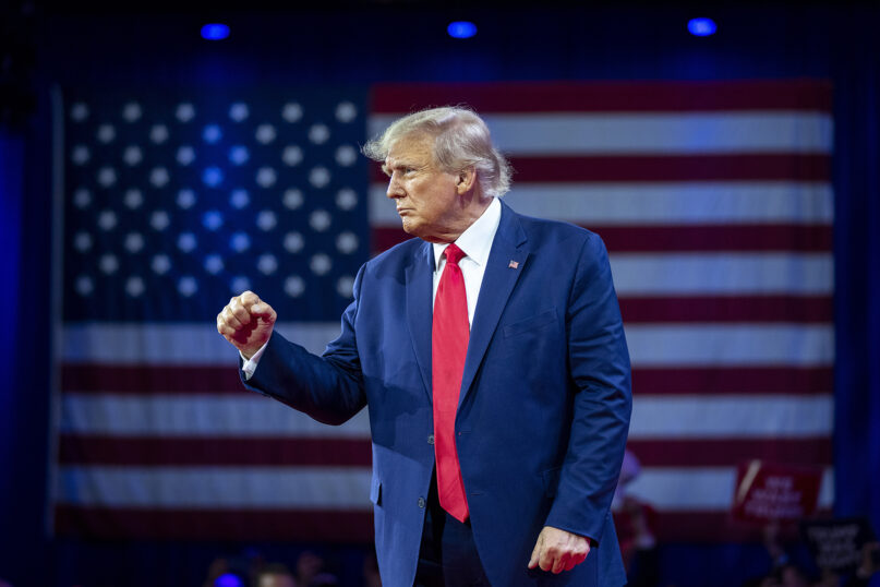 Former President Donald Trump pumps his fist as he departs after speaking at the Conservative Political Action Conference, CPAC 2023, Saturday, March 4, 2023, at National Harbor in Oxon Hill, Maryland. (AP Photo/Alex Brandon)