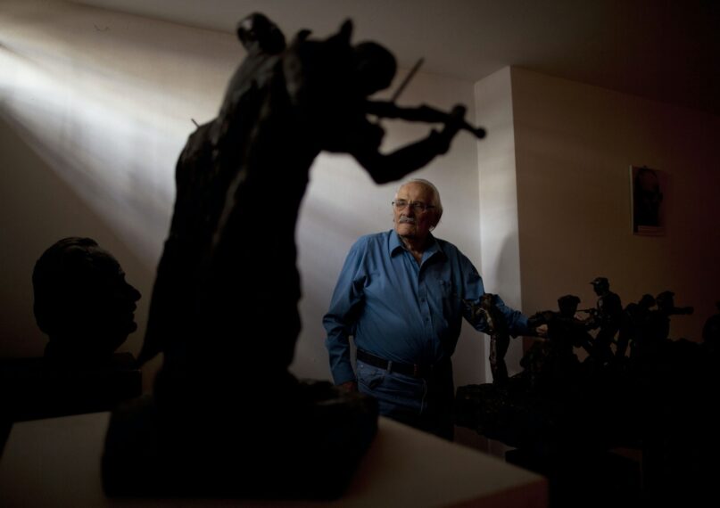 Samuel Willenberg, the last survivor of the Treblinka uprising, poses for a picture at his art studio in Tel Aviv, Israel, in 2010.  (AP Photo/Oded Balilty)