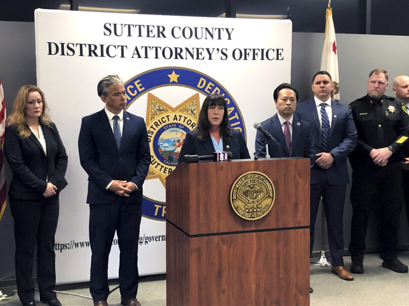 Sutter County District Attorney Jennifer Dupré speaks at a news conference in Yuba City, Calif., on Monday, April 17, 2023. Dupré announced the arrest of more than a dozen people on charges including conspiracy to commit murder. Dupré says the men are members of one of two rival syndicates in the Sikh community responsible for a series of shootings. (AP Photo/Adam Beam)