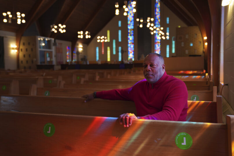 The Rev. Dale Snyder sits in the pews at Bethel AME Church where he is pastor, in Pittsburgh on Tuesday, April 11, 2023. Bethel, considered Pittsburgh's oldest Black congregation, lost its previous sanctuary when much of Pittsburgh's historic Lower Hill District was razed in the 1950s, making way for an arena and expressway in an urban renewal project. More than 60 years later, in what's being called a step toward 