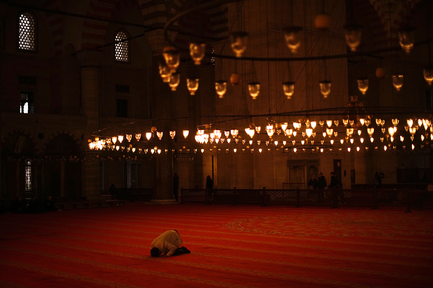 A Muslim worshipper offers a pray during the Muslim holy fasting month of Ramadan at Suleymaniye mosque in Istanbul, Turkey, Wednesday, April 5, 2023. Islam's holiest month is a period of intense prayer, dawn-to-dusk fasting and nightly feasts. (AP Photo/Francisco Seco)