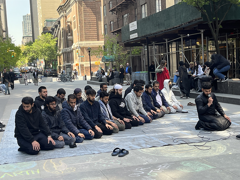 Muslim males pray during a demonstration for better religious spaces at Baruch College, Thursday, April 20, 2023, in New York City. Photo by Heerea Kaur Rikhraj