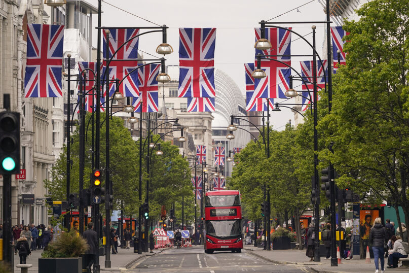 Union flags hang over Oxford Street in London, April 27, 2023, ahead of the coronation of Britain’s King Charles III. (AP Photo/Alberto Pezzali)