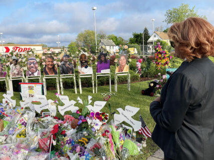 The memorial in front of Tops featuring photographs and flowers to remember those killed in the supermarket shooting. Courtesy Bishop Vashti McKenzie