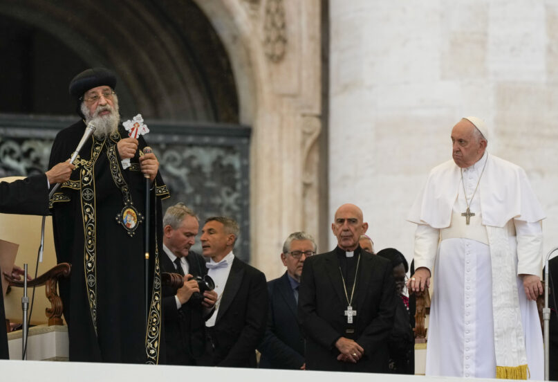 Pope Francis, right, starts his weekly general audience in St. Peter's Square at The Vatican, with the leader of the Coptic Orthodox Church of Alexandria, Tawadros II, Wednesday, May 10, 2023. (AP Photo/Alessandra Tarantino)