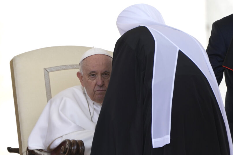 Pope Francis talks to Metropolitan Anthony, in charge of foreign relations during his weekly general audience in St. Peter's Square at The Vatican, Wednesday, May 3, 2023. (AP Photo/Alessandra Tarantino)