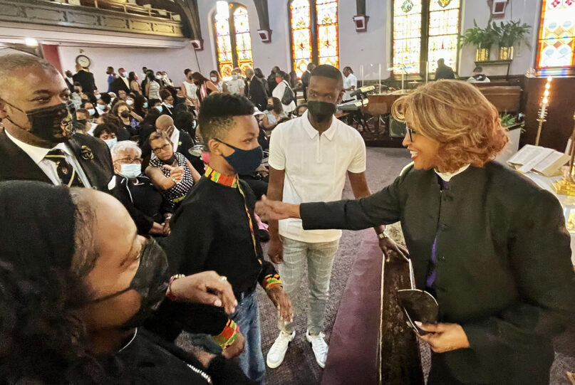 Bishop Vashti McKenzie greets community members in Buffalo, N.Y., at Bethel AME Church after worship the Sunday following the shooting at a Tops supermarket in May 2022. Courtesy of Bishop Vashti McKenzie