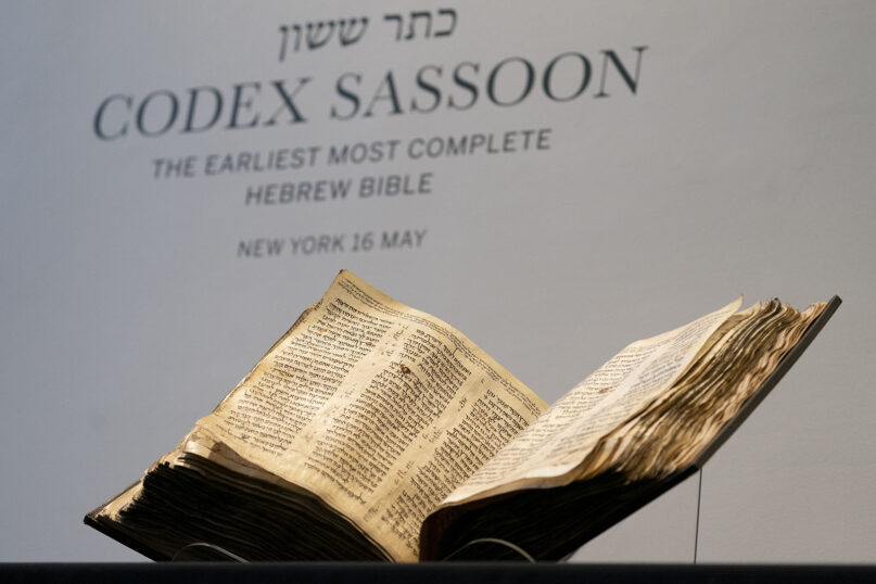 Sotheby's unveils the Codex Sassoon for auction, Feb. 15, 2023, in the Manhattan borough of New York. The 1,100-year-old Hebrew Bible, which is one of the oldest surviving biblical manuscripts, sold for $38.1 million, which includes the auction house's fee, on May 17, 2023, in New York. (AP Photo/John Minchillo)