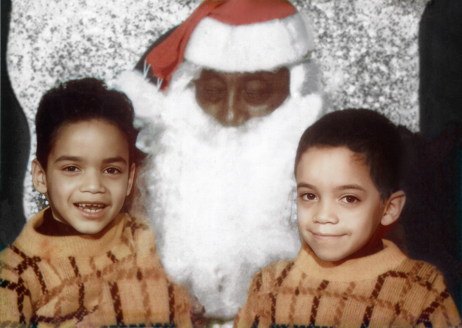 John Blake, left, with his younger brother, Pat, sitting with Santa. Courtesy Blake