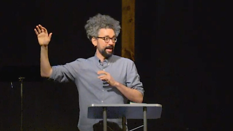 Pastor Joshua Butler preaches at Redemption Church in Tempe, Arizona,  in February 2023. Video screen grab