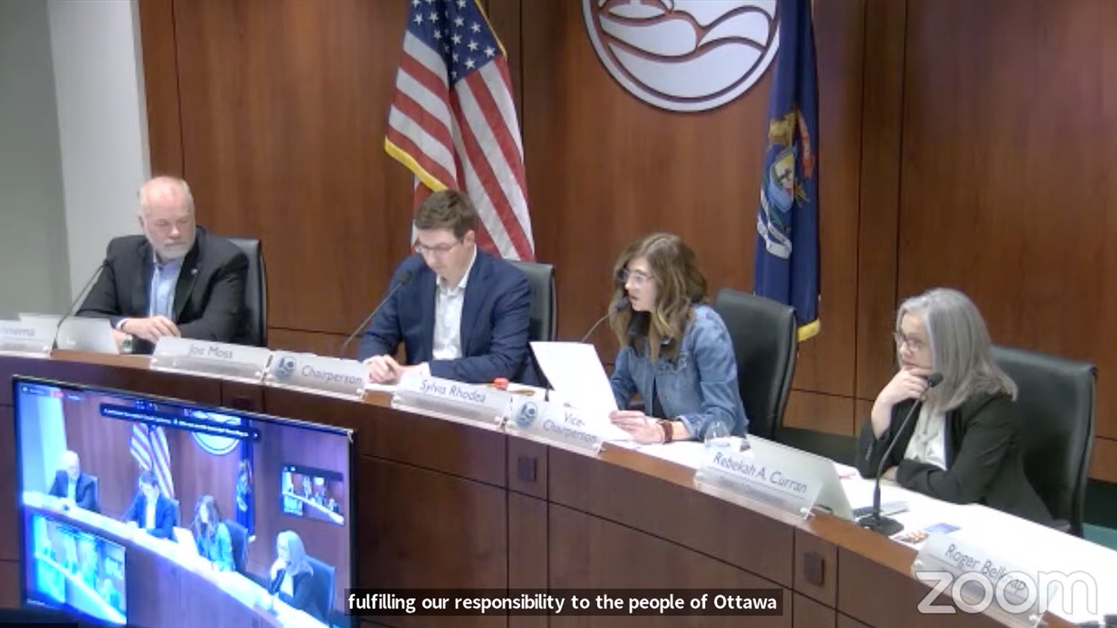 Vice-Chairperson Sylvia Rhodea, second from right, speaks during an Ottawa County Board of Commissioners meeting, Tuesday, May 23, 2023, in Grand Haven, Michigan. Video screen grab
