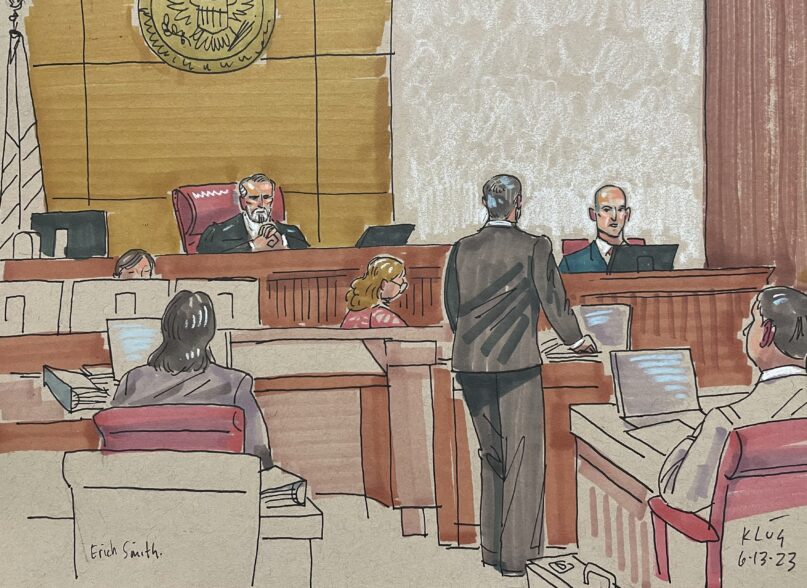 In this courtroom sketch, Erich Smith testifies Tuesday, June 13, 2023, in Pittsburgh, in the federal trial of Robert Bowers. Bowers is accused of shooting to death 11 worshippers in a synagogue more than four years ago, the deadliest antisemitic attack in U.S. history. (AP Photo/David Klug)