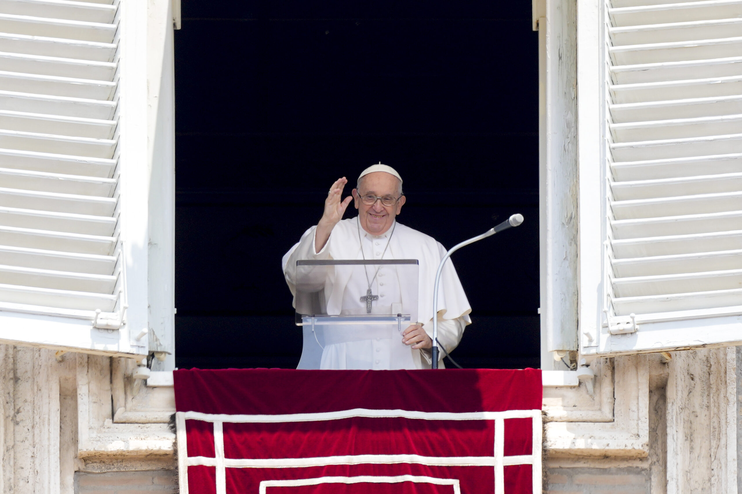 Pope Francis delivers his blessing as he recites the Angelus noon prayer from the window of his studio overlooking St.Peter's Square, at the Vatican, Sunday, June 18, 2023. (AP Photo/Andrew Medichini)