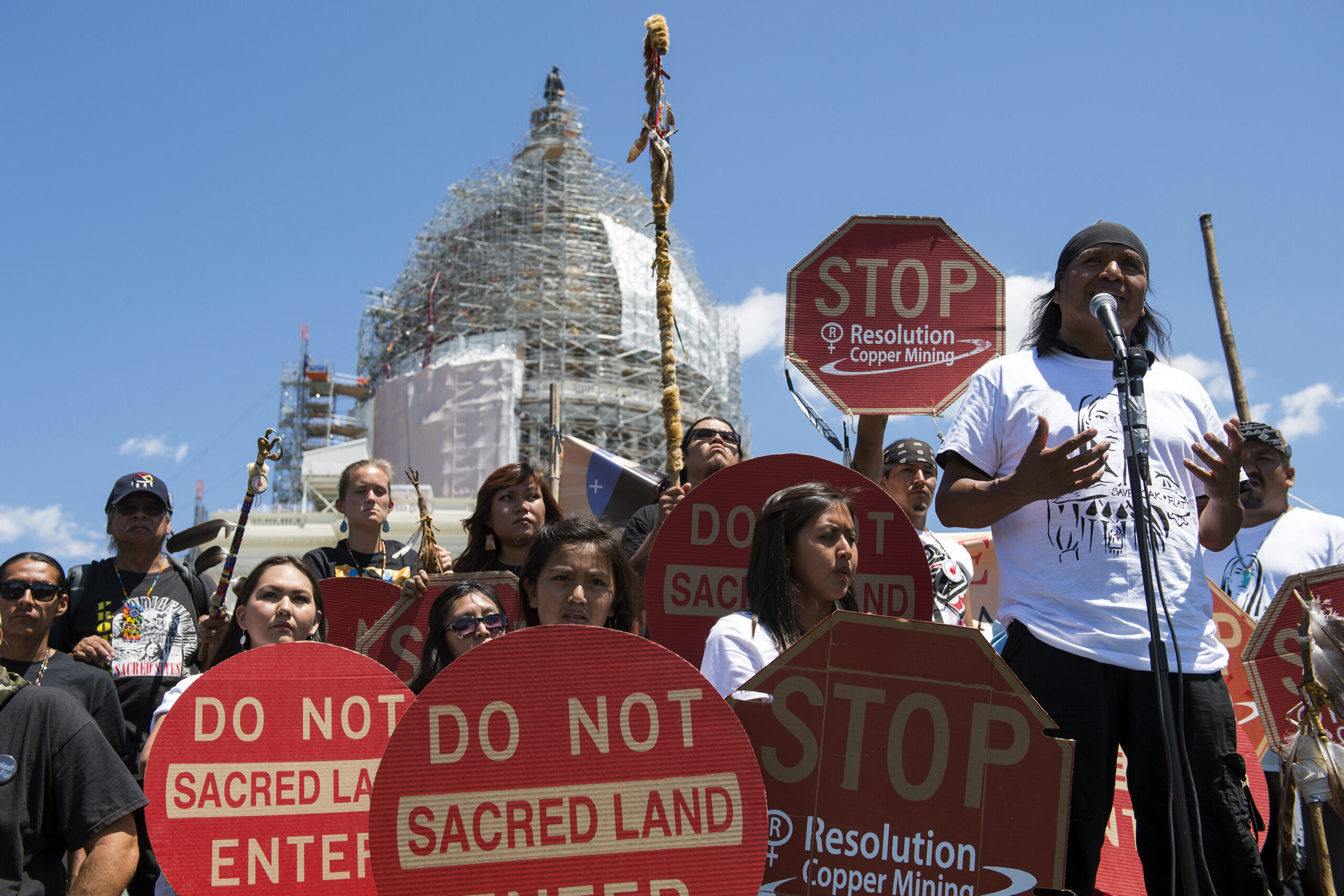 FILE - Tribal councilman Wendsler Nosie, Sr. speaks with Apache activists in a rally to save Oak Flat, land near Superior, Ariz., sacred to Western Apache tribes, in front of the U.S. Capitol in Washington, on July 22, 2015. Oak Flat, a piece of national forest land in central Arizona, is at the heart of a years long struggle between Native American groups and mining interests that both consider it important for their future. (AP Photo/Molly Riley, File)