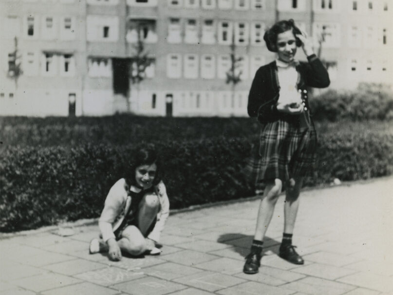 Anne Frank (1929 - 1945), left, and her friend Hannah Goslar (known as Hanneli) playing at the Merwedeplein in Amsterdam, May 1940. (Photo by Anne Frank Fonds - Basel via Getty Images)