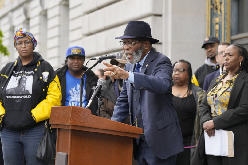 The Rev. Amos C. Brown speaks at a reparations rally outside of City Hall in San Francisco, March 14, 2023. Supervisors in San Francisco are taking up a draft reparations proposal that includes a $5 million lump-sum payment for every eligible Black person. (AP Photo/Jeff Chiu)