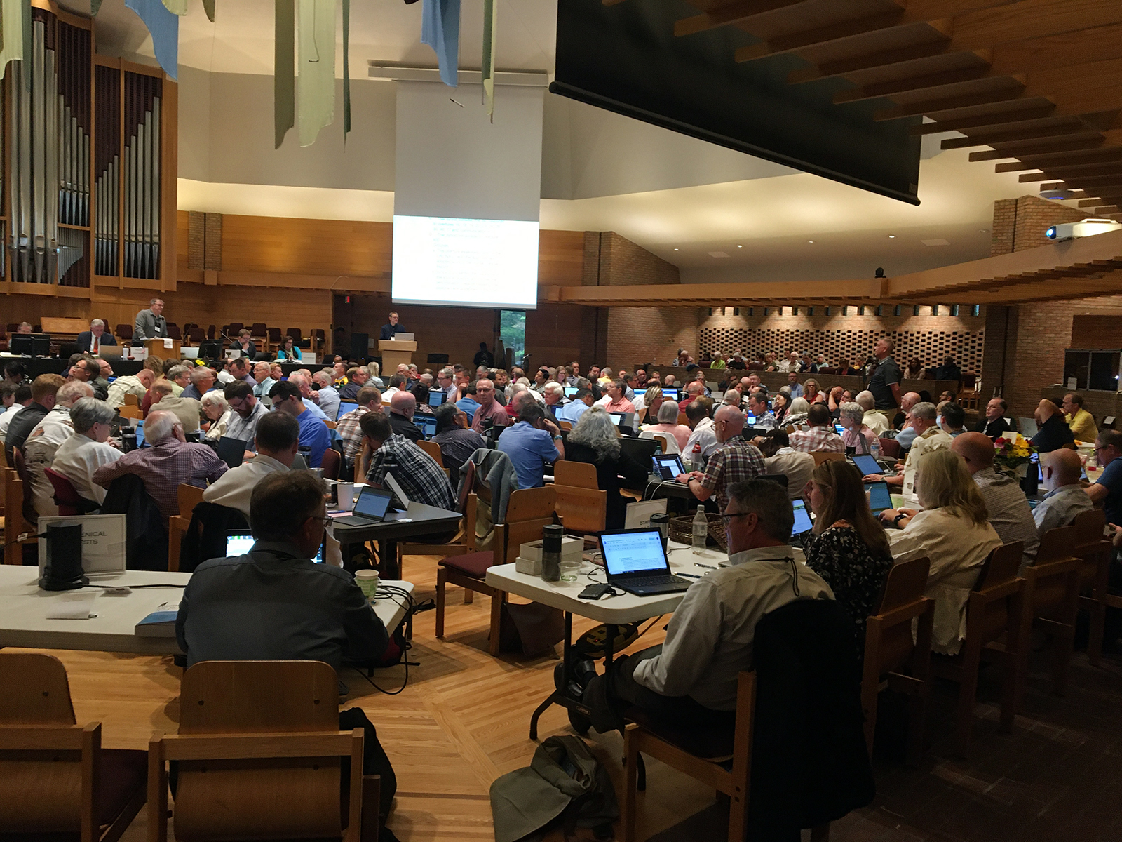 People attend the annual synod of the Christian Reformed Church at Calvin University in Grand Rapids, Michigan, Tuesday, June 13, 2023. Photo by Grace Buller