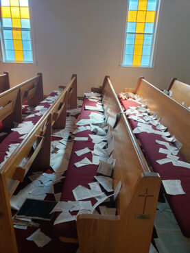 Pages that were torn from Bibles and from hymnals litter the pews and sanctuary at Fowler United Methodist Church in Annapolis, Maryland, on June 9, 2023. Photos courtesy Fowler UMC