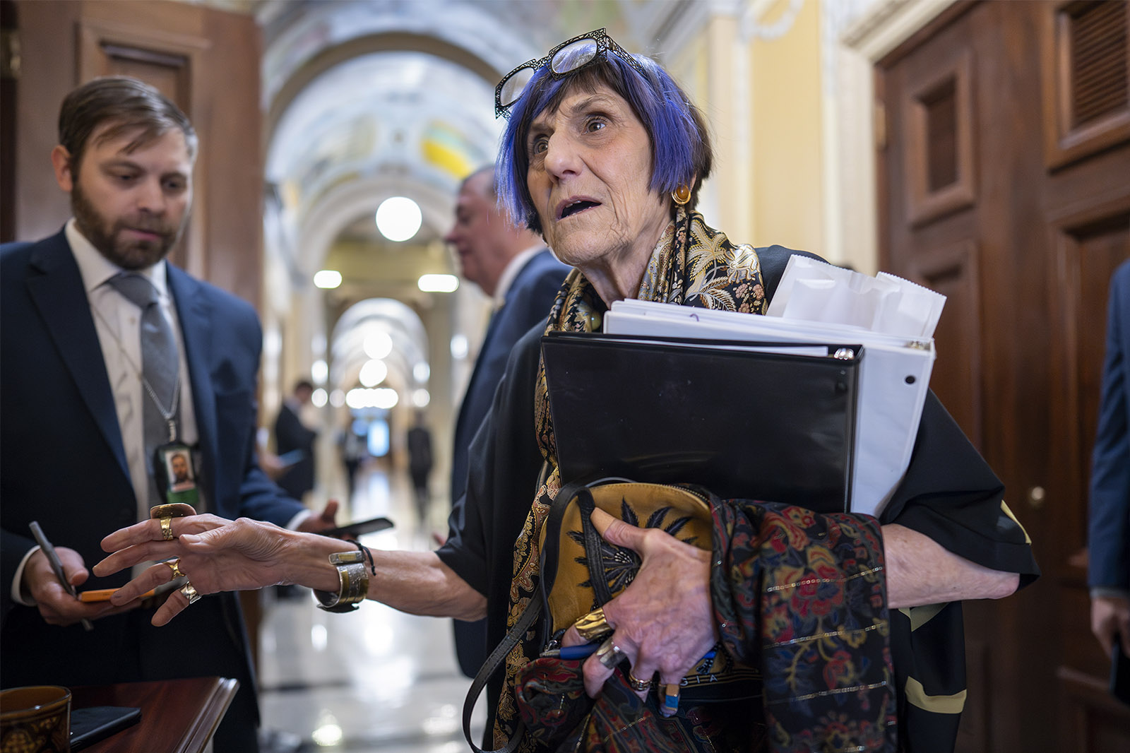 Rep. Rosa DeLauro, D-Conn., the ranking member of the House Appropriations Committee, surrenders her electronic devices as she arrives for a closed Defense Subcommittee markup hearing on the Fiscal Year 2024 spending bill for the Pentagon, at the Capitol in Washington, Thursday, June 15, 2023. (AP Photo/J. Scott Applewhite)
