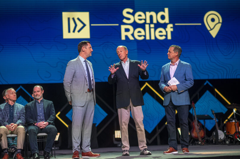 Paul Chitwood, from left, president of the International Mission Board, Bryant Wright, president of Send Relief, and Kevin Ezell, president of the North American Mission Board, present during the Southern Baptist Convention annual meeting in New Orleans, La., on June 13, 2023. (RNS photo/Emily Kask)