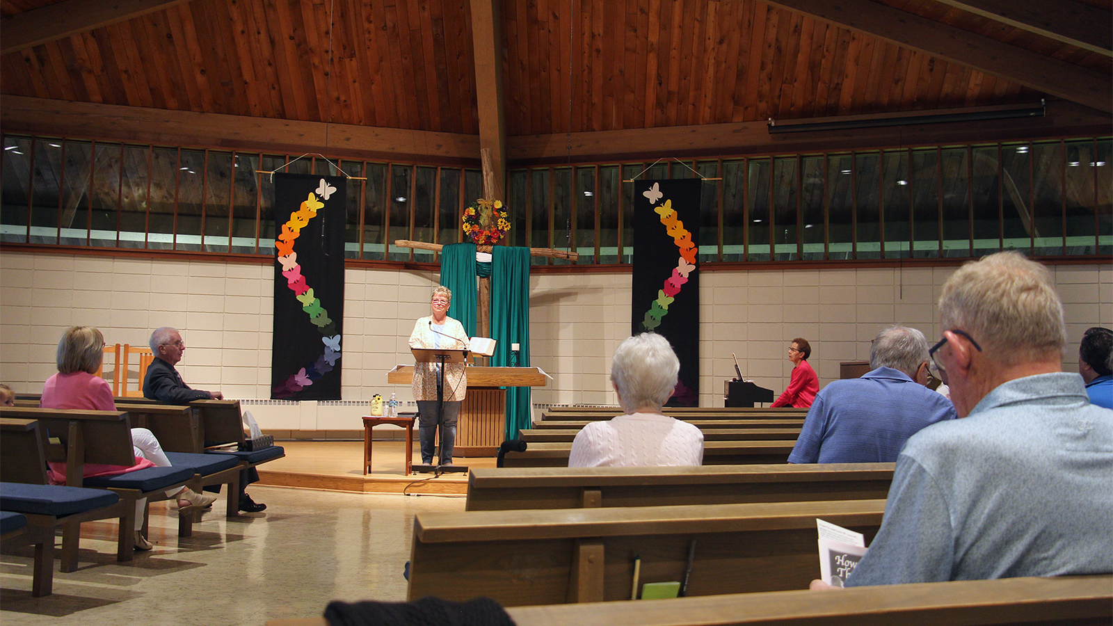 Denise Edlund, family ministry coordinator and finance chair of Christ United Methodist Church in Greenfield, Wisconsin, shares that the Wisconsin Conference of the United Methodist Church approved the church's disaffiliation before worship on June 11, 2023. RNS photo by Emily McFarlan Miller