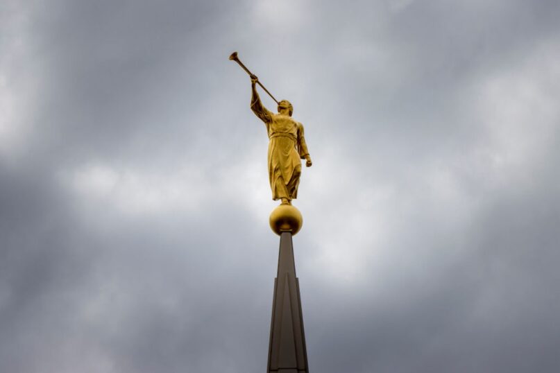 A golden sculpture of the angel Moroni atop the temple of the Church of Jesus Christ of Latter-day Saints in Rexburg, Idaho. (Natalie Behring/Getty Images)