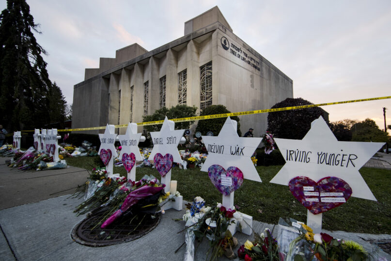 FILE - A makeshift memorial stands outside the Tree of Life Synagogue in the aftermath of a deadly shooting in Pittsburgh, Oct. 29, 2018. (AP Photo/Matt Rourke, File)