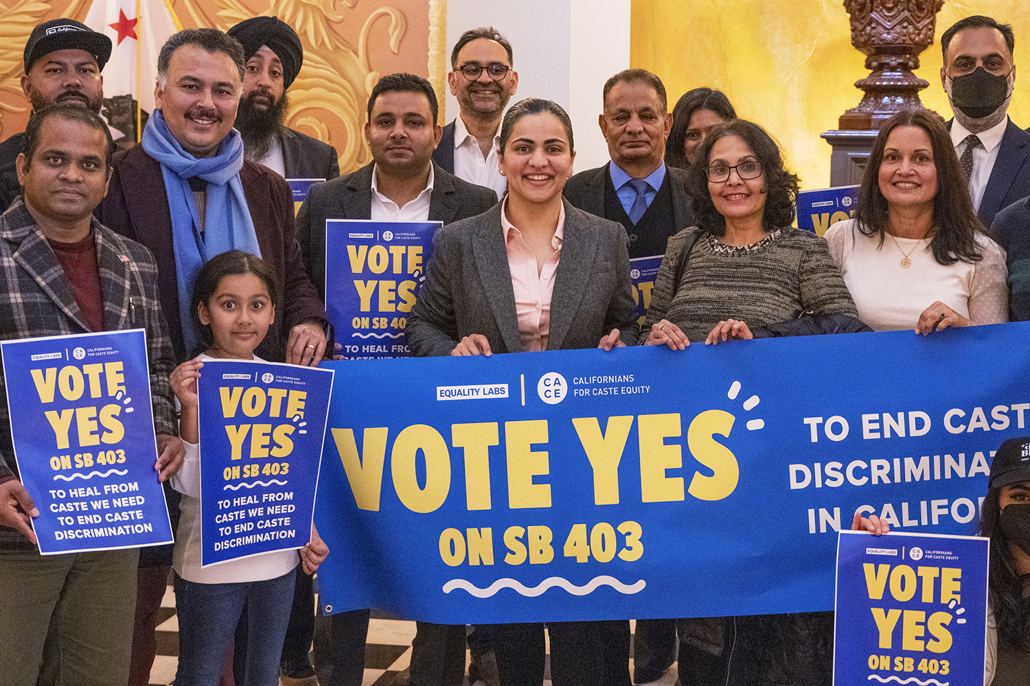 Califiornia state Sen. Aisha Wahab, center, stands with supporters after a news conference where she proposed SB 403, a bill that would add caste as a protected category in the state’s anti-discrimination laws, in Sacramento, Calif., March 22, 2023. (AP Photo/José Luis Villegas)
