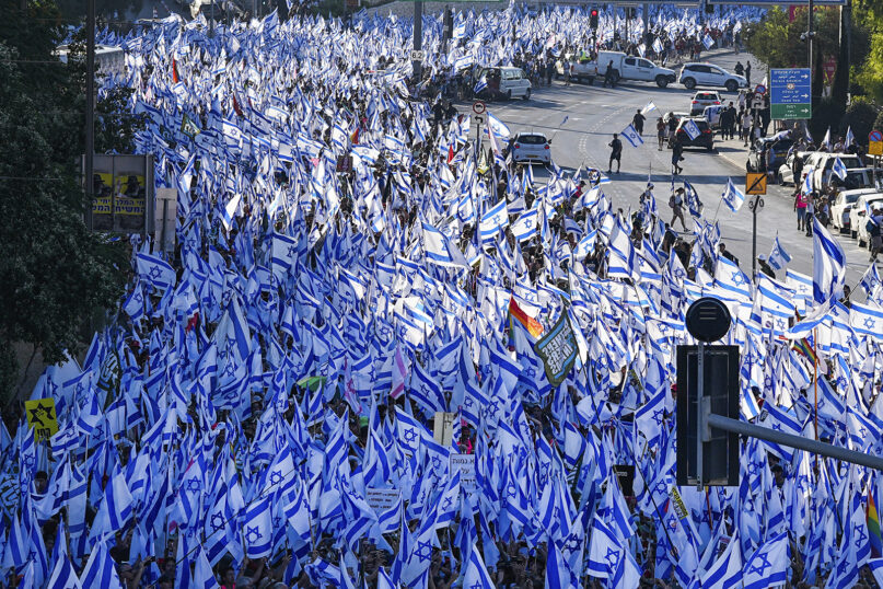 Thousands of Israelis march to Jerusalem in protest of plans by Prime Minister Benjamin Netanyahu’s government to overhaul the judicial system, in Jerusalem, July 22, 2023. (AP Photo/Ohad Zwigenberg)