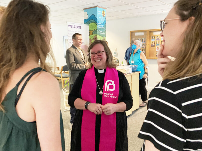 A group of women from a Presbyterian church in Chapel Hill, N.C., came to hear Rebecca Todd Peters’ sermon at a Unitarian-Universalist church on July 9, 2023. One also asked her to sign her book, “Trust Women,” which Peters published in 2018. RNS photo by Yonat Shimron