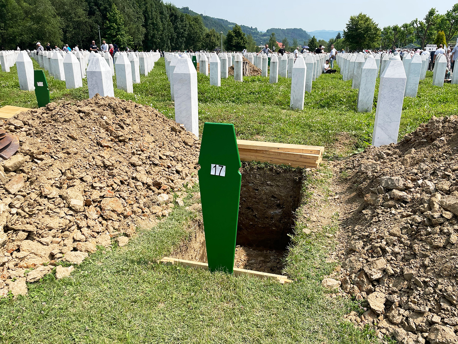 An gravesite waits empty and marked with a number during the Srebrenica Genocide Commemoration in early July. A number of remains were returned to the site as part of the commemoration ceremony. Photo by David Ian Klein