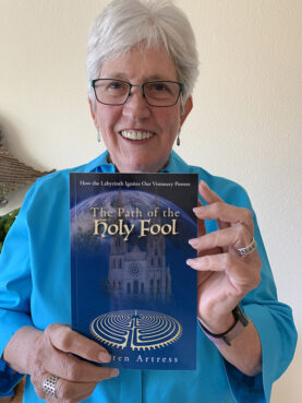 The Rev. Lauren Artress with her book "The Path of the Holy Fool." Courtesy photo