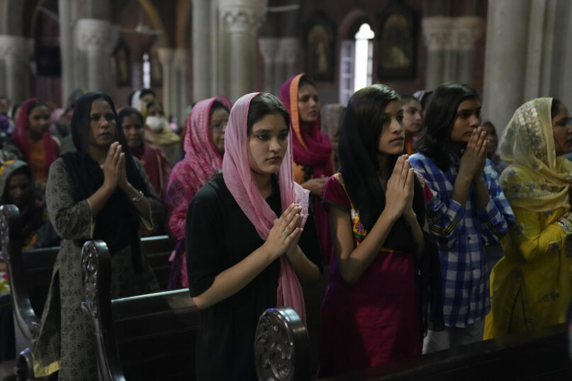 Pakistani Christians pray for Jaranwala Christians after the recent attack on a Christian area by an angry Muslim mob, in Lahore, Pakistan, Sunday, Aug. 20, 2023. (AP Photo/K.M. Chaudary)