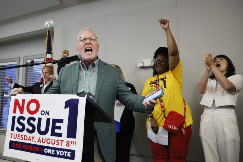 Dennis Willard, spokesperson for One Person One Vote, celebrates the results of the election during a watch party Aug. 8, 2023, in Columbus, Ohio. Ohio voters resoundingly rejected a Republican-backed measure that would have made it more difficult to pass abortion protections. (AP Photo/Jay LaPrete, File)