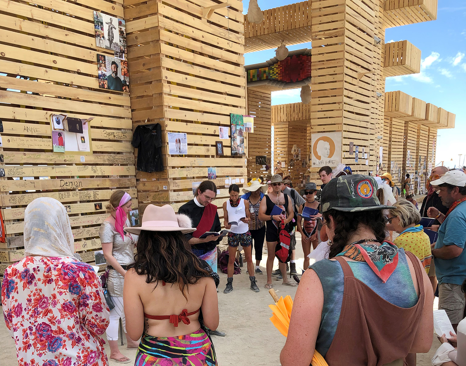 Religious AF camp members and visitors hold an Ash Wednesday service at the Temple during Burning Man 2019 in Black Rock City, Nevada. Photo by Alex Leach