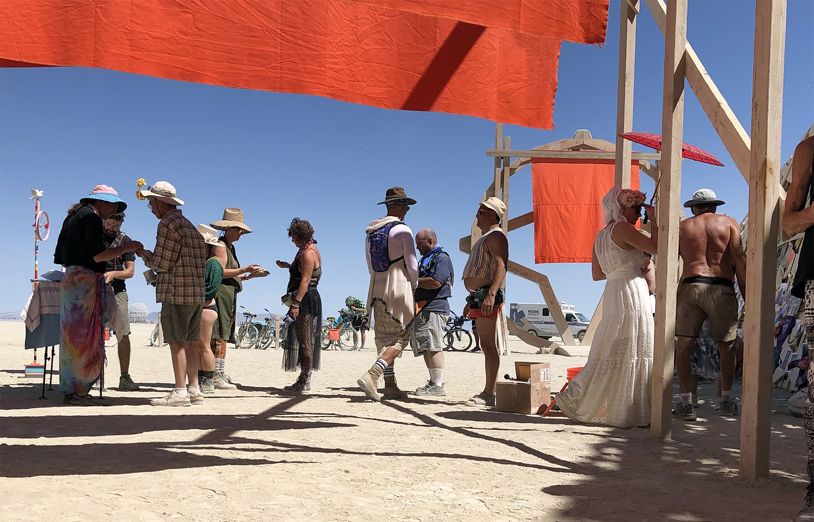 Religious AF camp offers communion during Burning Man 2022 in Black Rock City, Nevada. Photo by Alex Leach