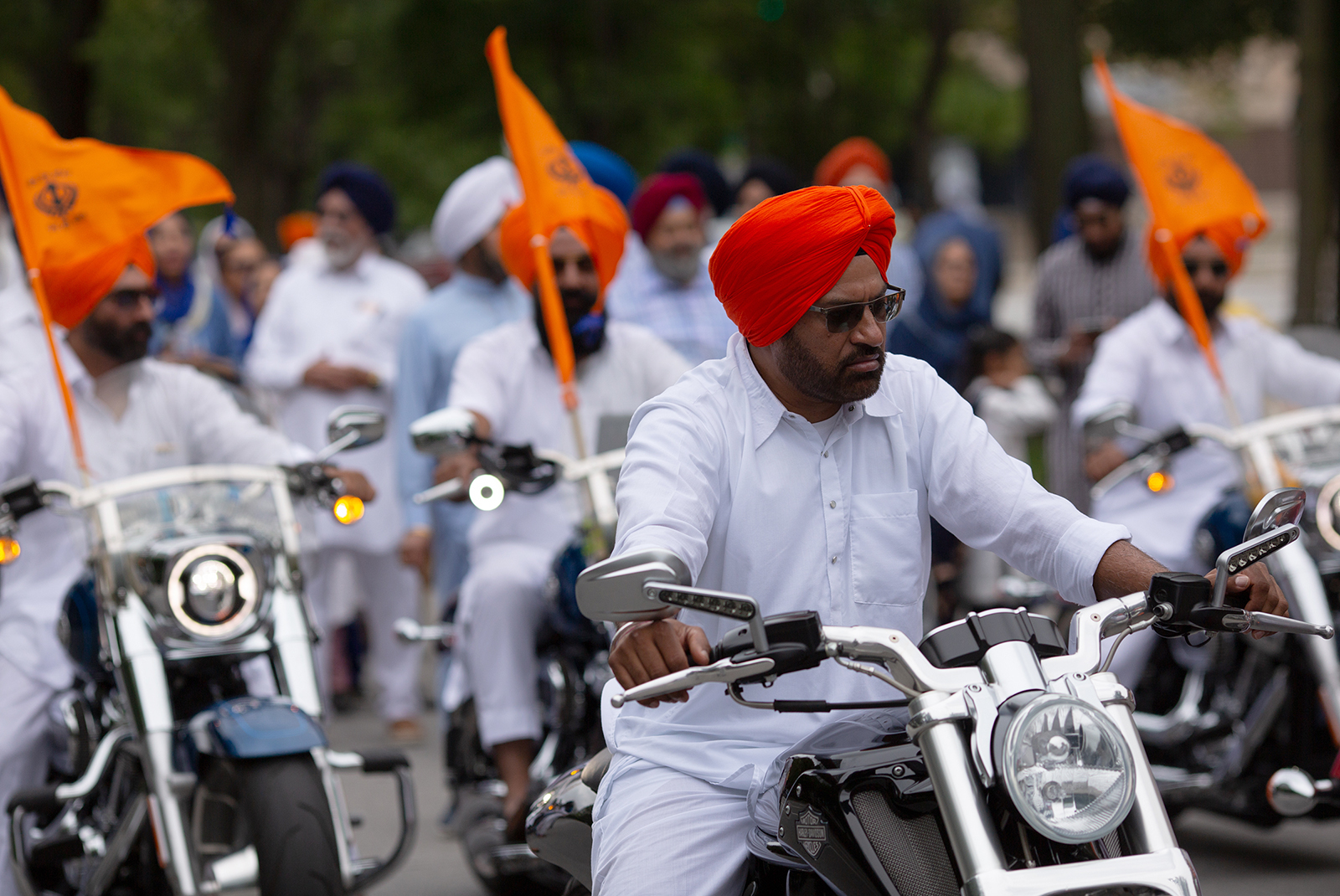 Sikh motorcyclists participate in the Parade of Faiths in Chicago on Aug. 13, 2023. The parade preceded the Parliament of the World's Religions, which began August 14. Photo by Lauren Pond for RNS