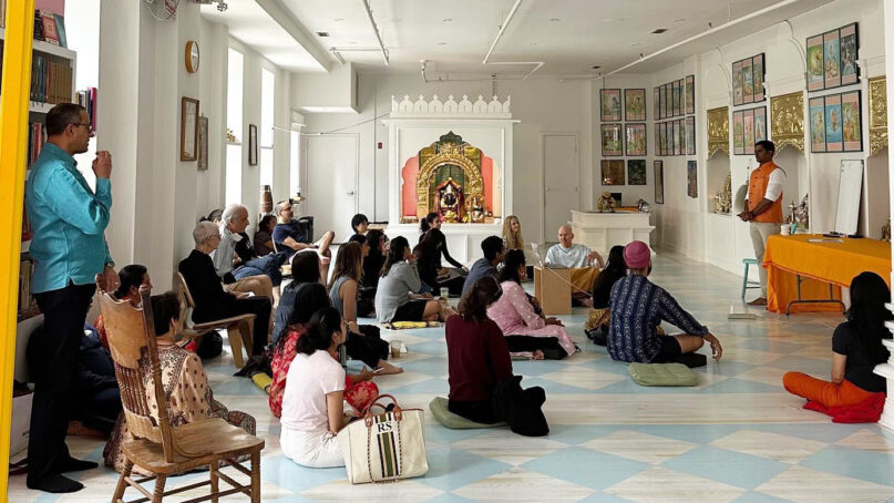 Vignesh Devraj, right, lectures at Broome Street Ganesha Temple on May 21, 2023, in Manhattan, New York. Photo courtesy of Broome Street Ganesha Temple