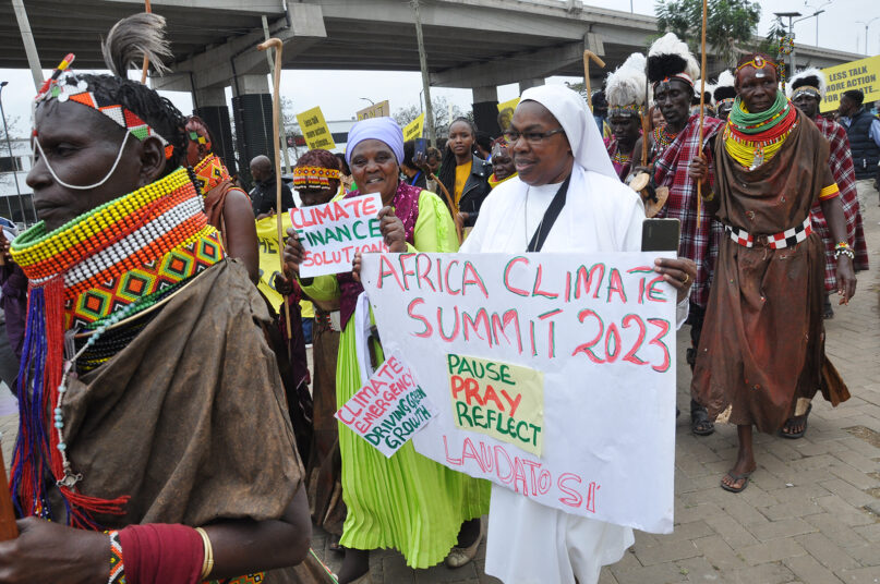 People from a variety of faiths and groups march through Nairobi, Kenya, before the Africa Climate Summit, Monday, Sept. 4, 2023. RNS photo by Fredrick Nzwili