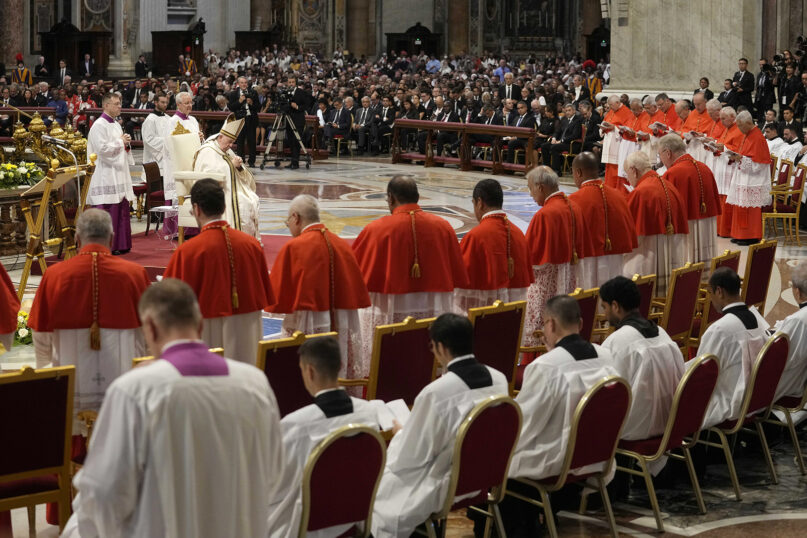 Pope Francis prays in front of new cardinals during a consistory inside St. Peter’s Basilica, at the Vatican, Aug. 27, 2022. (AP Photo/Andrew Medichini)