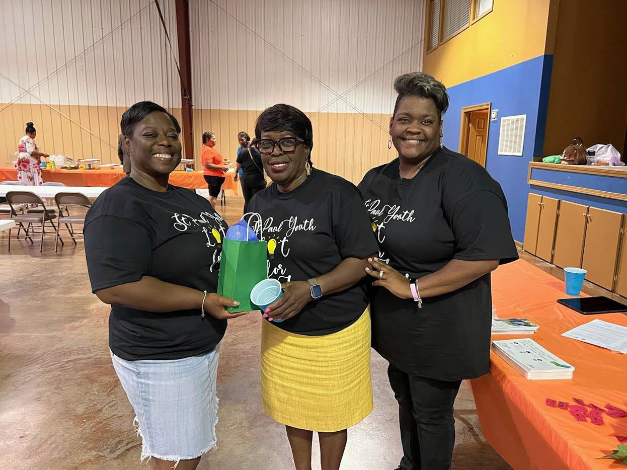 Kimberly Anthony, from left, the Rev. Belinda Johnson and LaDonna Watkins pose together during an Affordable Connectivity Program workshop at St. Paul African Methodist Episcopal Zion Church in Canton, Mississippi, on Sept. 17, 2023. Courtesy photo