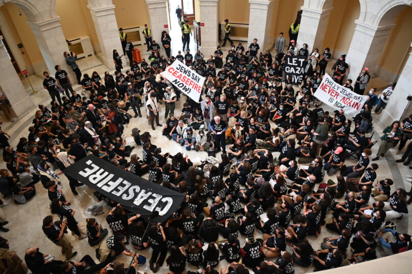 Hundreds of demonstrators calling for a cease-fire in Gaza gather in the U.S. Capitol's Cannon House Office Building rotunda on Oct. 18, 2023. The group was primarily organized by Jewish Voice for Peace. (RNS photo/Jack Jenkins)