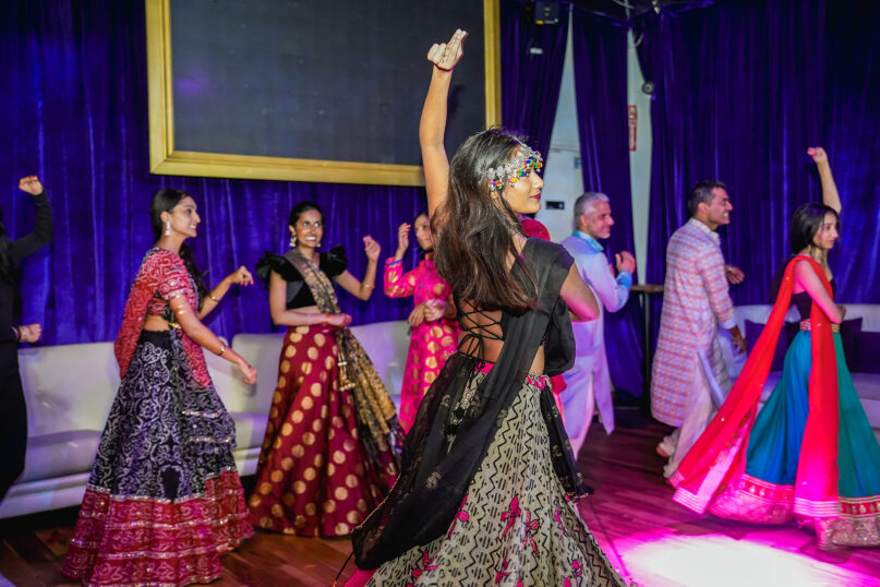 People dance during the Dandiya Drop garba in New York City. Photo by Misha Patel