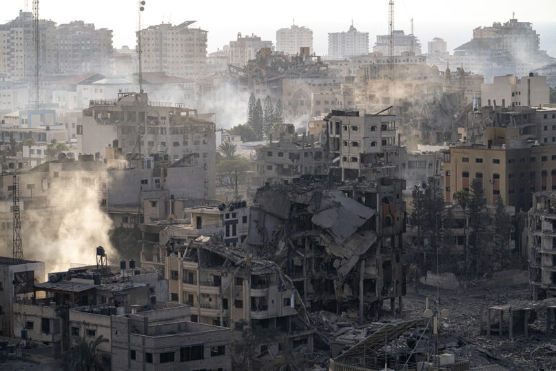 Destruction from Israeli aerial bombardment is seen in Gaza City, Oct. 11, 2023. (AP Photo/Fatima Shbair)